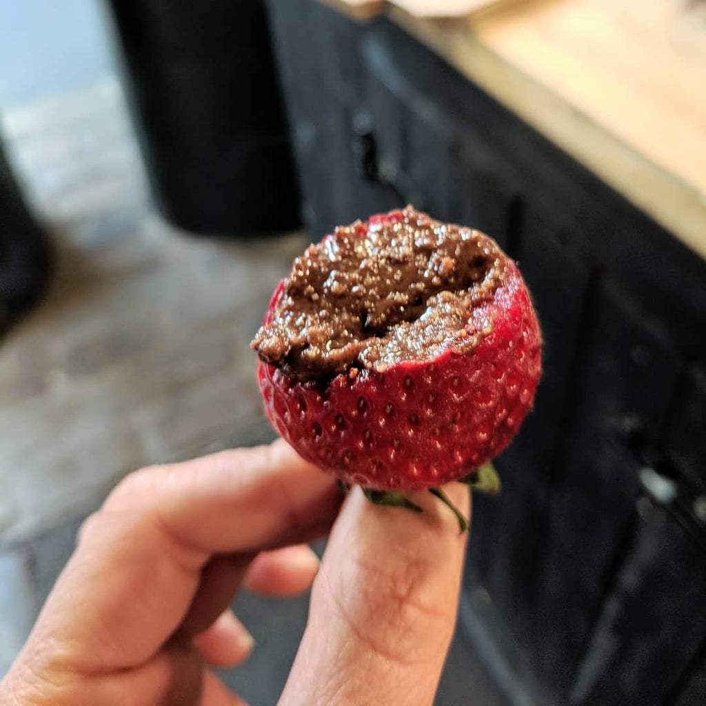 Strawberries dipped in Hazelnut & Cacao nut butter.